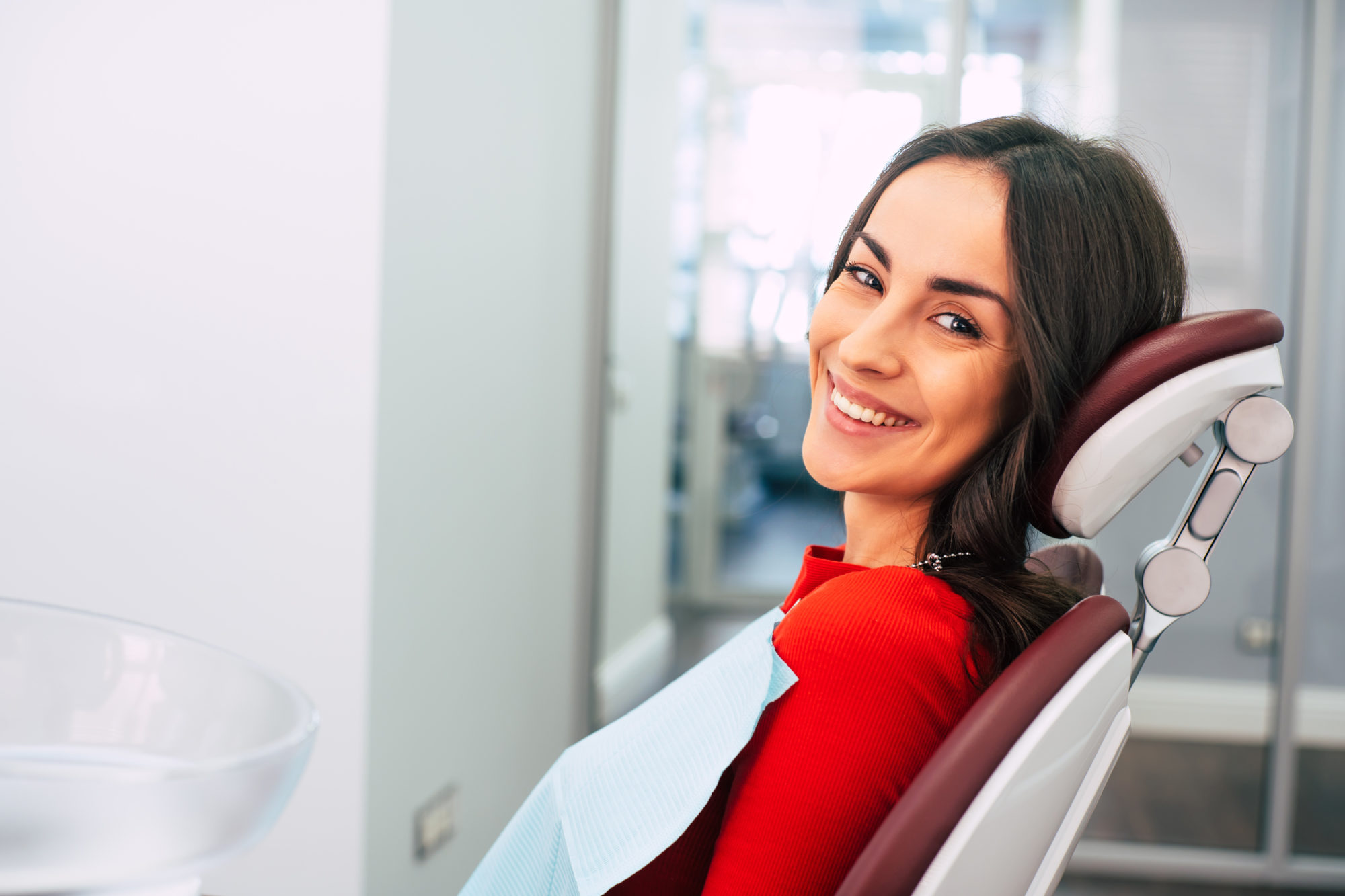 woman smiling at dentist's office