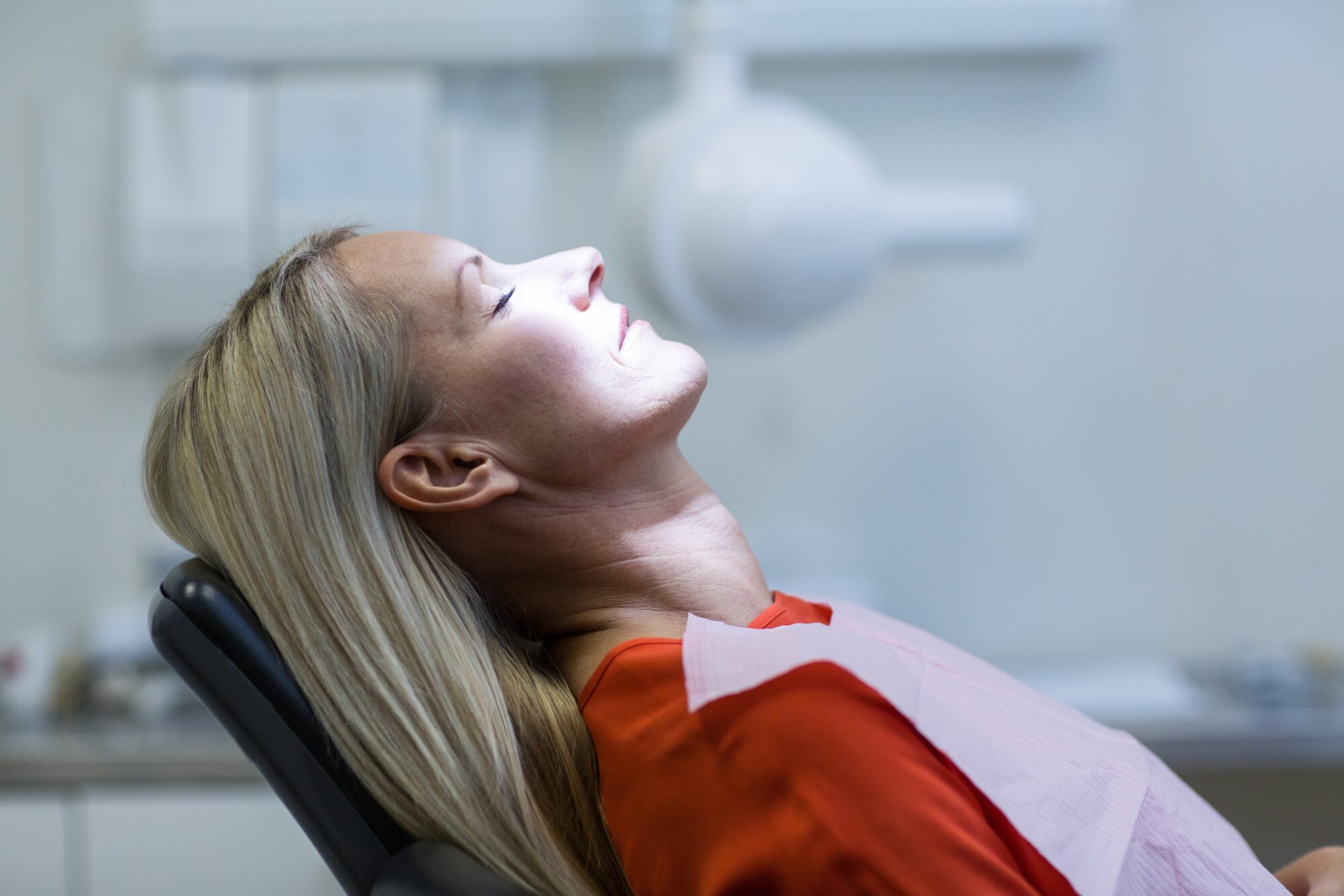 Woman relaxing on dentist chair